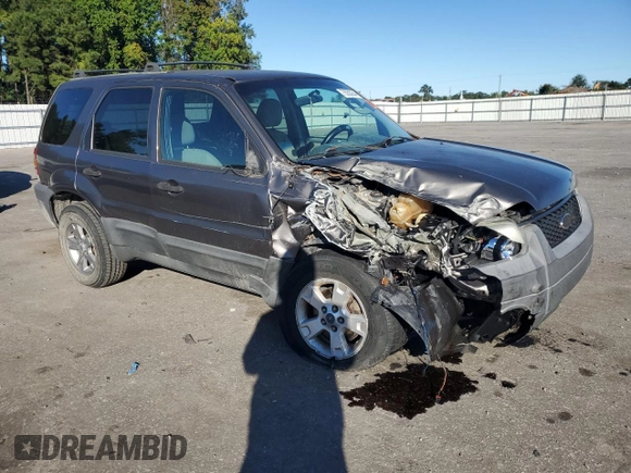 2005 Ford Escape XLT with VIN 1FMCU93105KA96729, listed as a Copart auction lot 75553354 with 220,081 mi miles and Salvage Title. Bid and sale history available at DreamBid. Image 4.