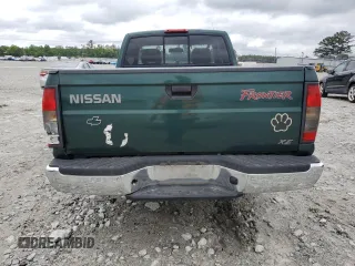 2000 Nissan Frontier XE with VIN 1N6DD26SXYC400648, listed as a Copart auction lot 58756855 with 148,051 mi miles and Salvage title. Bid and sale history available at DreamBid. Image 6.