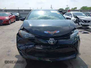 2019 Toyota Corolla L z VIN 5YFBURHE7KP905555, wystawiony jako IAAI lot #41943232 z przebiegiem 83 213 mil mil oraz . Historia ofert i sprzedaży dostępna na DreamBid. Obrazek 13.