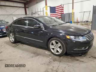 2014 Volkswagen CC Sport with VIN WVWBP7AN4EE537603, listed as a Copart auction lot 65530194 with 173,835 mi miles and Salvage Title. Bid and sale history available at carsss.com. Image 4.