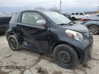 2014 Scion iQ with VIN JTNJJXB04EJ029974, listed as a Copart auction lot 48307365 with 102,901 mi miles and Salvage Title. Bid and sale history available at carsss.com. Image 4.