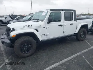 2022 Jeep Gladiator Willys with VIN 1C6HJTAG1NL148524, listed as a IAAI auction lot 41507693 with 42,004 mi miles and . Bid and sale history available at DreamBid. Image 2.