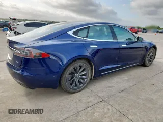 2018 Tesla Model S 75D с VIN 5YJSA1E26JF275221, выставлен на аукционе Copart как лот 61101885 с пробегом 122 530 миль миль и Списание • Salvage title. История ставок и продаж доступна на DreamBid. Изображение 3.
