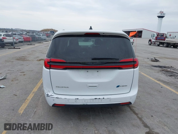 2023 Chrysler Pacifica Hybrid Touring L z VIN 2C4RC1L74PR540870, wystawiony jako IAAI lot #42056528 z przebiegiem 46 940 mil mil oraz . Historia ofert i sprzedaży dostępna na DreamBid. Obrazek 17.