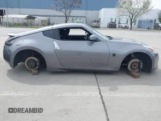 2012 Nissan 370Z Touring with VIN JN1AZ4EH4CM561415, listed as a IAAI auction lot 41838948 with 111,298 mi miles. Bid and sale history available at carsss.com. Image 13.
