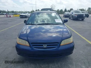 2002 Honda Accord LX with VIN JHMCG56482C014034, listed as a IAAI auction lot 42110164 with 95,657 mi miles and . Bid and sale history available at DreamBid. Image 6.