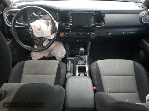 2021 Toyota Tacoma SR with VIN 3TMCZ5AN0MM395357, listed as a Copart auction lot 87086684 with 48,664 mi miles and Salvage title. Bid and sale history available at DreamBid. Image 8.
