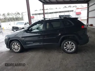 2020 Jeep Cherokee Latitude z VIN 1C4PJLCB1LD535765, wystawiony jako IAAI lot #41580618 z przebiegiem 56 040 mil mil oraz . Historia ofert i sprzedaży dostępna na DreamBid. Obrazek 14.