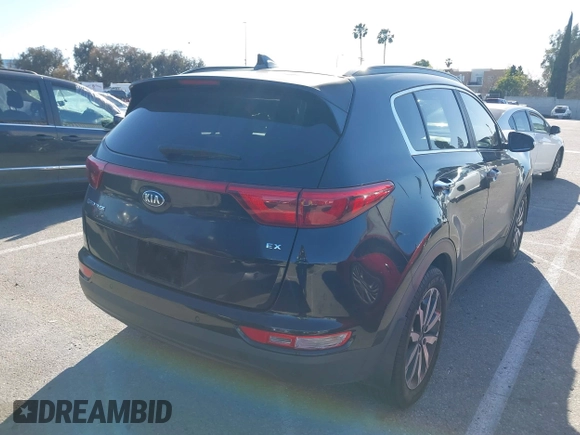 2018 Kia Sportage EX with VIN KNDPN3AC6J7387429, listed as a IAAI auction lot 41833920 with 105,307 mi miles and . Bid and sale history available at DreamBid. Image 4.