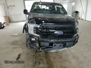 2018 Ford F-150 XL with VIN 1FTFW1EG1JFC18807, listed as a Copart auction lot 60664725 with 129,841 mi miles and Salvage title. Bid and sale history available at DreamBid. Image 12.