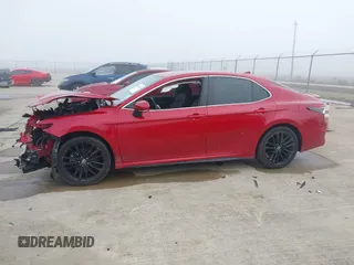 2021 Toyota Camry XSE z VIN 4T1K61AKXMU426592, wystawiony jako IAAI lot #41651425 z przebiegiem 56 485 mil mil oraz . Historia ofert i sprzedaży dostępna na DreamBid. Obrazek 14.