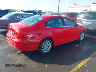 2014 Volkswagen Jetta Sedan SE w/Connectivity with VIN 3VWD07AJ7EM288652, listed as a IAAI auction lot 41630616 with 130,860 mi miles. Bid and sale history available at carsss.com. Image 4.
