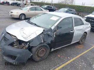 2009 Toyota Corolla with VIN 1NXBU40E39Z146748, listed as a IAAI auction lot 41523817 with 223,552 mi miles. Bid and sale history available at carsss.com. Image 6.
