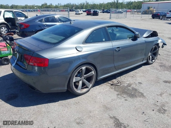 2013 Audi RS 5 with VIN WUAC6AFR2DA900747, listed as a IAAI auction lot 41822517 with 76,468 mi miles. Bid and sale history available at carsss.com. Image 4.