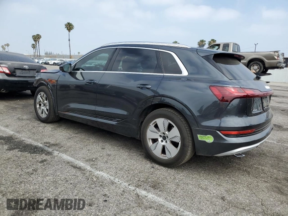 2019 Audi e-tron Premium Plus with VIN WA1LABGE3KB014614, listed as a Copart auction lot 60864165 with 37,718 mi miles and Salvage title. Bid and sale history available at DreamBid. Image 2.