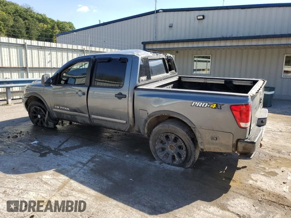 2015 Nissan Titan SL with VIN 1N6BA0EC5FN509230, listed as a Copart auction lot 73983574 with 144,288 mi miles and Salvage Title. Bid and sale history available at carsss.com. Image 2.