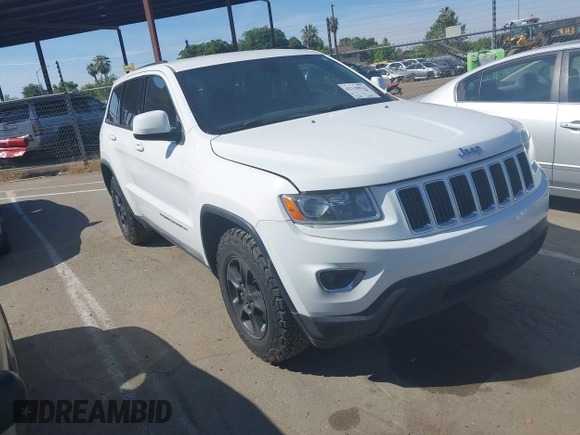 2014 Jeep Grand Cherokee Laredo with VIN 1C4RJFAG9EC334021, listed as a IAAI auction lot 42128823 with 161,741 mi miles. Bid and sale history available at carsss.com. Image 1.