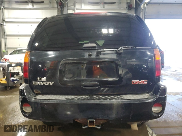 2004 GMC Envoy SLT with VIN 1GKDT13S642191868, listed as a Copart auction lot 82334304 with 150,810 mi miles and Salvage Title. Bid and sale history available at carsss.com. Image 6.