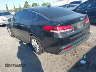 2017 Kia Optima LX with VIN 5XXGT4L30HG152700, listed as a IAAI auction lot 41826259 with 143,438 mi miles. Bid and sale history available at carsss.com. Image 3.