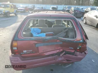 1996 Ford Escort z VIN 1FASP15J7TW112703, wystawiony jako Copart lot #84905564 z przebiegiem 119 575 mil mil oraz Szkoda całkowita • Salvage title. Historia ofert i sprzedaży dostępna na DreamBid. Obrazek 6.