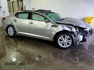 2013 Kia Optima EX с VIN 5XXGN4A70DG239393, выставлен на аукционе Copart как лот 41923615 с пробегом Не указан миль и Списание • Salvage title. История ставок и продаж доступна на DreamBid. Изображение 13.