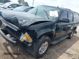 2010 Chevrolet Suburban LT with VIN 1GNUCJE06AR138587, listed as a IAAI auction lot 42145484 with 283,318 mi miles and . Bid and sale history available at DreamBid. Image 2.