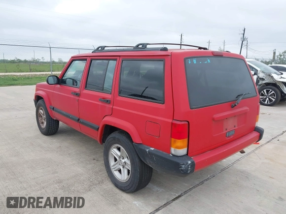 2001 Jeep Cherokee Sport with VIN 1J4FT48S01L537833, listed as a IAAI auction lot 41943255 with 239,473 mi miles. Bid and sale history available at carsss.com. Image 3.