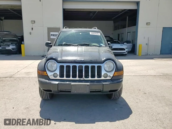 2006 Jeep Liberty Limited with VIN 1J4GL58K36W122621, listed as a Copart auction lot 60894695 with 87,384 mi miles and Salvage title. Bid and sale history available at DreamBid. Image 14.