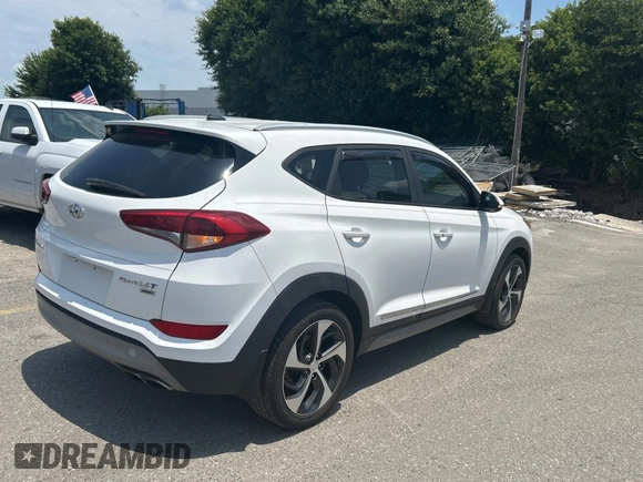 2017 Hyundai Tucson Sport with VIN KM8J3CA29HU351485, listed as a Copart auction lot 56537955 with 121,371 mi miles and Clean Title. Bid and sale history available at DreamBid. Image 4.