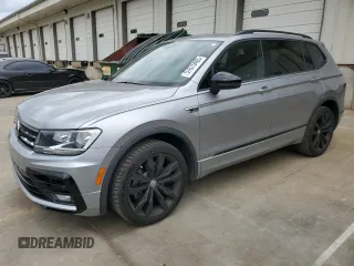 2021 Volkswagen Tiguan SE z VIN 3VV3B7AX8MM117650, wystawiony jako Copart lot #57075485 z przebiegiem 51 309 mil mil oraz Szkoda całkowita • Salvage title. Historia ofert i sprzedaży dostępna na DreamBid. Obrazek 1.