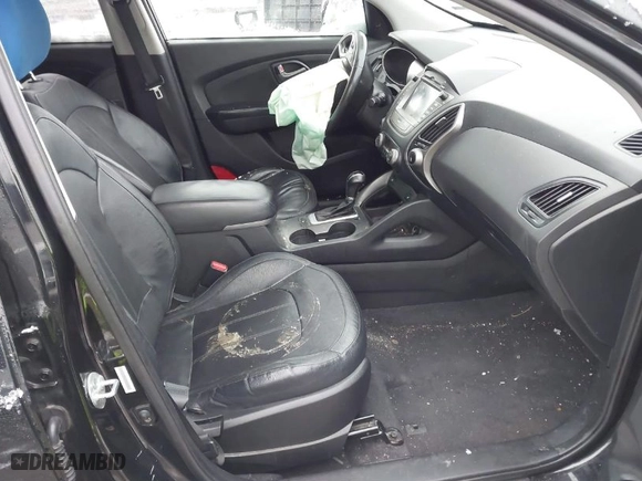 2015 Hyundai Tucson SE with VIN KM8JU3AG5FU965245, listed as a IAAI auction lot 41565341 with 197,787 mi miles. Bid and sale history available at carsss.com. Image 5.