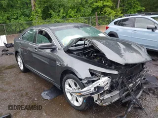 2018 Ford Taurus SEL z VIN 1FAHP2E85JG101221, wystawiony jako IAAI lot #42242127 z przebiegiem 123 787 mil mil oraz . Historia ofert i sprzedaży dostępna na DreamBid. Obrazek 1.