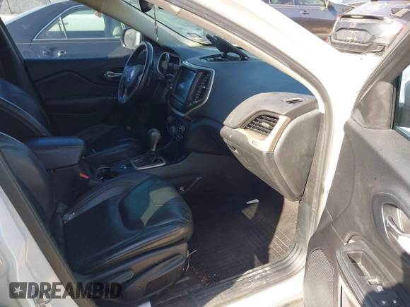 2016 Jeep Cherokee Limited with VIN 1C4PJLDB8GW256788, listed as a IAAI auction lot 41657339 with 104,630 mi miles. Bid and sale history available at carsss.com. Image 5.