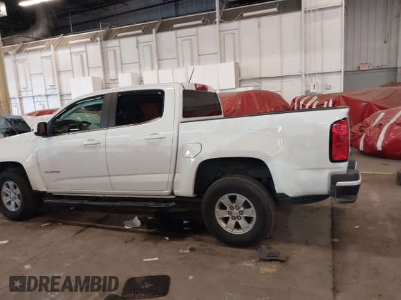 2019 Chevrolet Colorado 2WD Work Truck with VIN 1GCGSBEN6K1349332, listed as a IAAI auction lot 41900272 with 68,657 mi miles and . Bid and sale history available at DreamBid. Image 14.