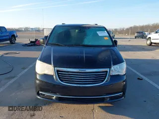 2014 Chrysler Town & Country Touring with VIN 2C4RC1BGXER124367, listed as a IAAI auction lot 41888366 with 143,638 mi miles and . Bid and sale history available at DreamBid. Image 12.