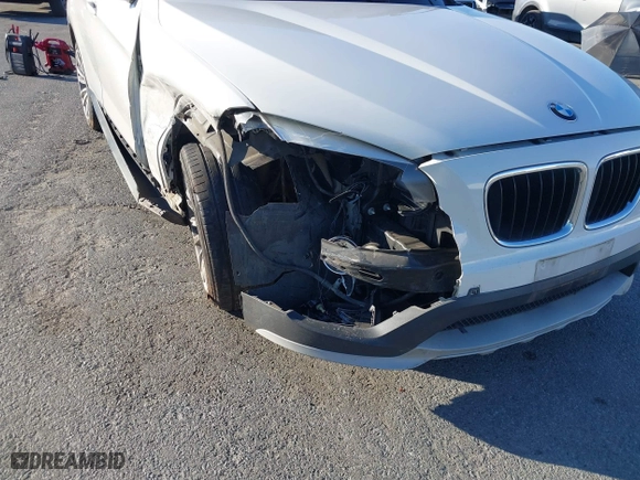 2015 BMW X1 xDrive28i with VIN WBAVL1C50FVY26009, listed as a IAAI auction lot 41495667 with 109,807 mi miles. Bid and sale history available at carsss.com. Image 6.