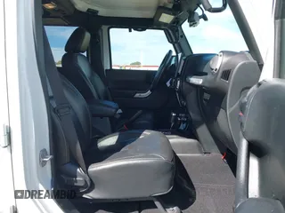 2017 Jeep Wrangler Unlimited Sahara with VIN 1C4BJWEG5HL588535, listed as a IAAI auction lot 42013571 with 70,012 mi miles. Bid and sale history available at carsss.com. Image 5.