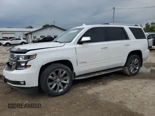2015 Chevrolet Tahoe LTZ with VIN 1GNSKCKC4FR590940, listed as a Copart auction lot 58715735 with 138,152 mi miles and Salvage title. Bid and sale history available at DreamBid. Image 1.