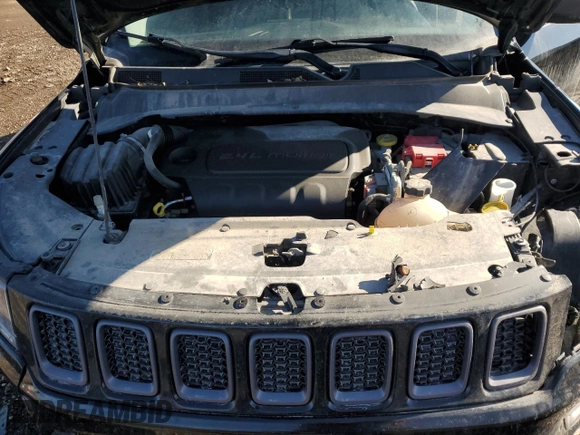 2019 Jeep Compass Trailhawk with VIN 3C4NJDDB1KT727756, listed as a Copart auction lot 42439055 with 104,525 mi miles and Salvage Title. Bid and sale history available at carsss.com. Image 12.