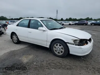 2000 Toyota Camry CE z VIN JT2BG28KXY0432024, wystawiony jako Copart lot #57057905 z przebiegiem 201 289 mil mil oraz Szkoda całkowita • Salvage title. Historia ofert i sprzedaży dostępna na DreamBid. Obrazek 4.