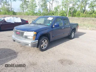 2009 GMC Canyon SLE1 with VIN 1GTCS139298121036, listed as a IAAI auction lot 41953007 with 230,957 mi miles. Bid and sale history available at carsss.com. Image 2.