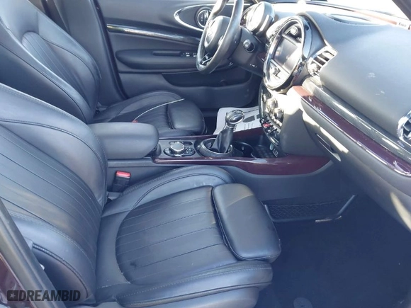 2016 MINI Cooper Clubman with VIN WMWLN5C50G2E29740, listed as a IAAI auction lot 41345976 with 67,124 mi miles. Bid and sale history available at carsss.com. Image 5.