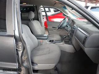 2004 Jeep Grand Cherokee Laredo with VIN 1J4GX48N64C436853, listed as a IAAI auction lot 41785918 with 118,578 mi miles. Bid and sale history available at carsss.com. Image 5.