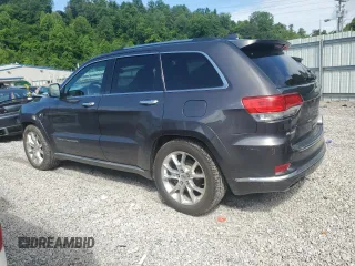2014 Jeep Grand Cherokee Summit with VIN 1C4RJFJT4EC346946, listed as a Copart auction lot 60613025 with 50,565 mi miles and Salvage title. Bid and sale history available at DreamBid. Image 2.