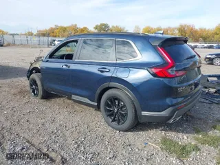 2025 Honda CR-V Hybrid Sport-L with VIN 5J6RS6H83SL005137, listed as a IAAI auction lot 40696596 with 1,776 mi miles. Bid and sale history available at carsss.com. Image 3.