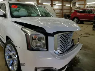 2017 GMC Yukon Denali with VIN 1GKS2CKJ0HR217831, listed as a Copart auction lot 48030555 with 163,050 mi miles and Salvage Title. Bid and sale history available at carsss.com. Image 14.
