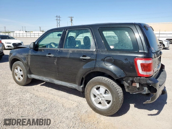 2011 Ford Escape XLS with VIN 1FMCU0C79BKC04115, listed as a Copart auction lot 56982375 with 193,078 mi miles and Salvage title. Bid and sale history available at DreamBid. Image 2.