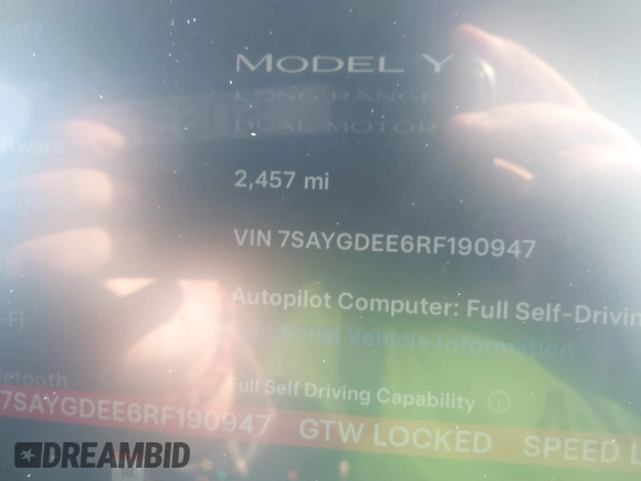 2024 Tesla Model Y Long Range with VIN 7SAYGDEE6RF190947, listed as a IAAI auction lot 41808973 with 2,457 mi miles. Bid and sale history available at carsss.com. Image 15.