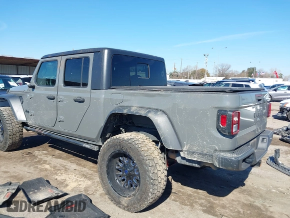 2020 Jeep Gladiator Sport S with VIN 1C6JJTAG6LL190749, listed as a IAAI auction lot 41401209 with 97,292 mi miles and . Bid and sale history available at DreamBid. Image 3.