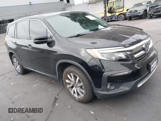 2020 Honda Pilot EX-L with VIN 5FNYF5H56LB003294, listed as a IAAI auction lot 42554368 with 45,263 mi miles and . Bid and sale history available at DreamBid. Image 1.